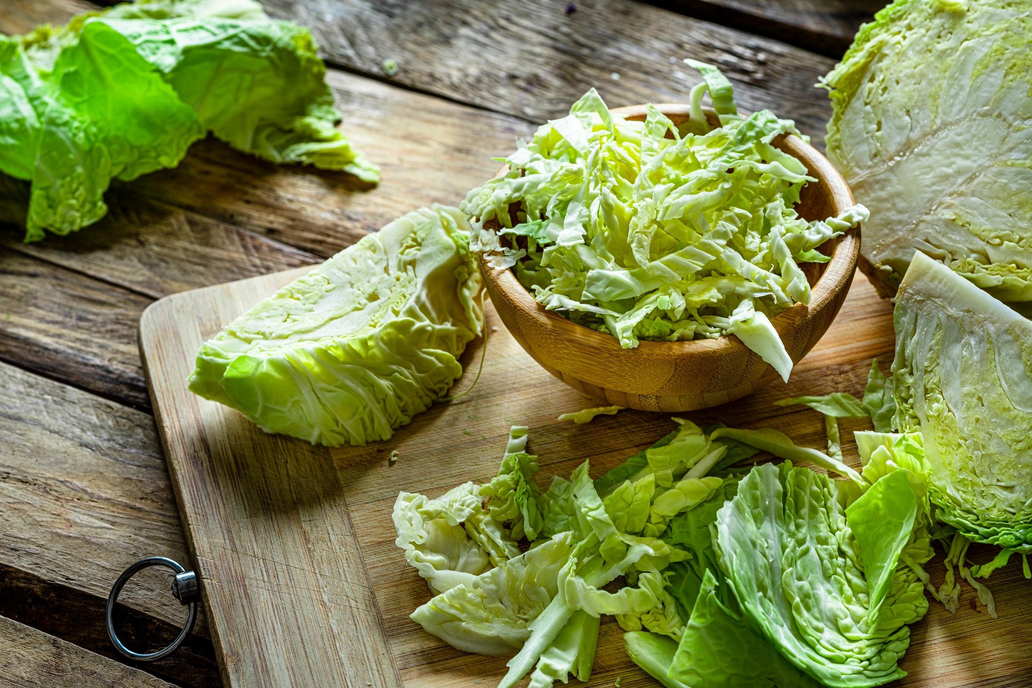 Shredded cabbage in a wooden bowl